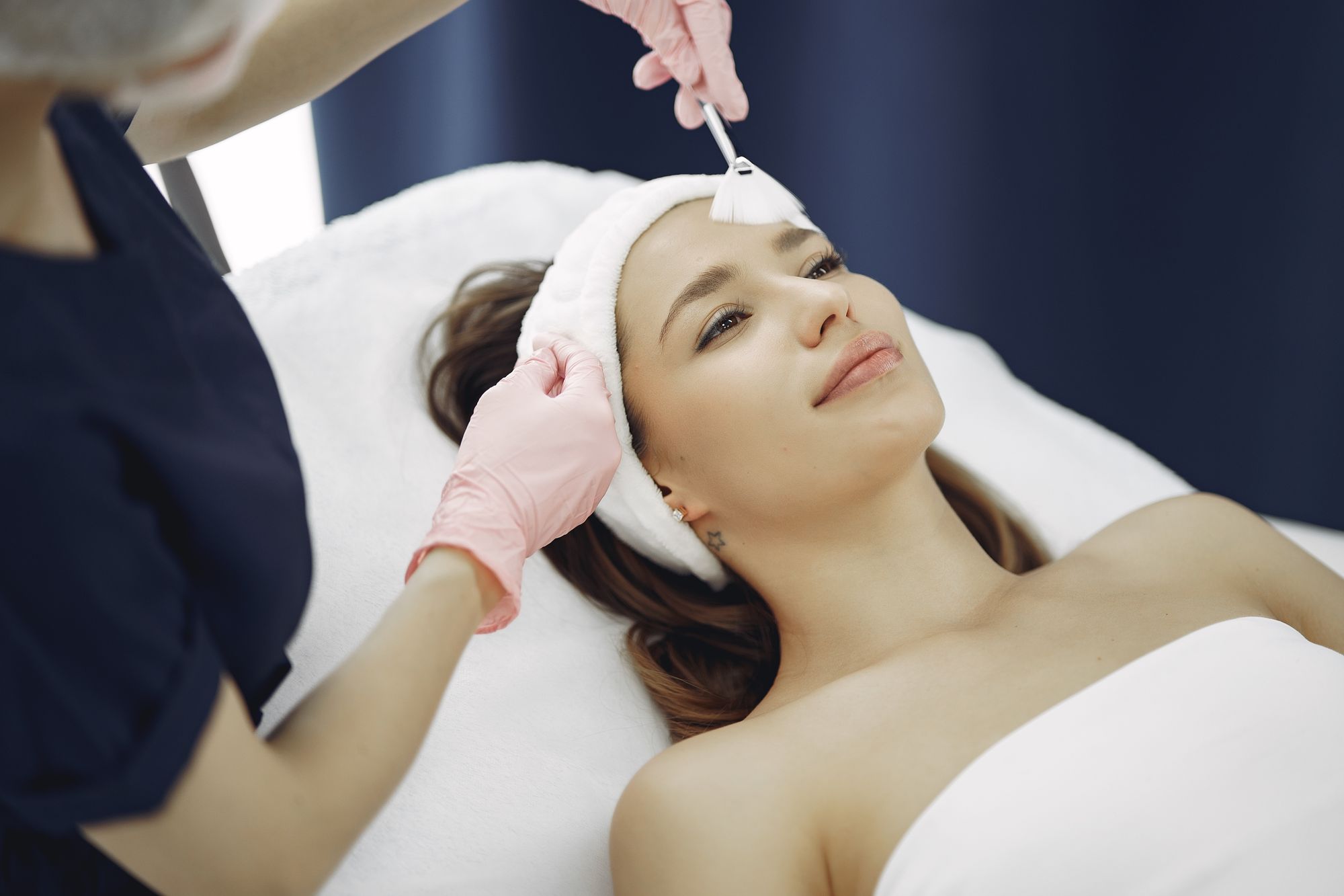 A client receiving a professional facial treatment